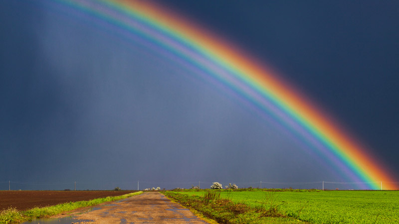 rainbow_dark_clouds_over_country_road