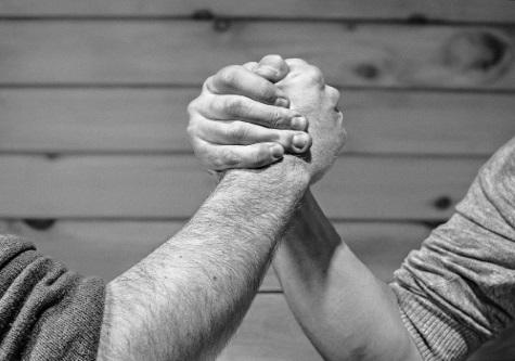 Arm wrestling showing strength