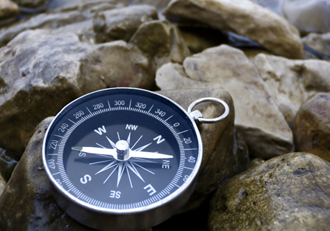 compass_on_rocks_w_water